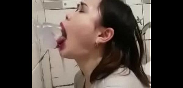  Asian deepthroating a dildo